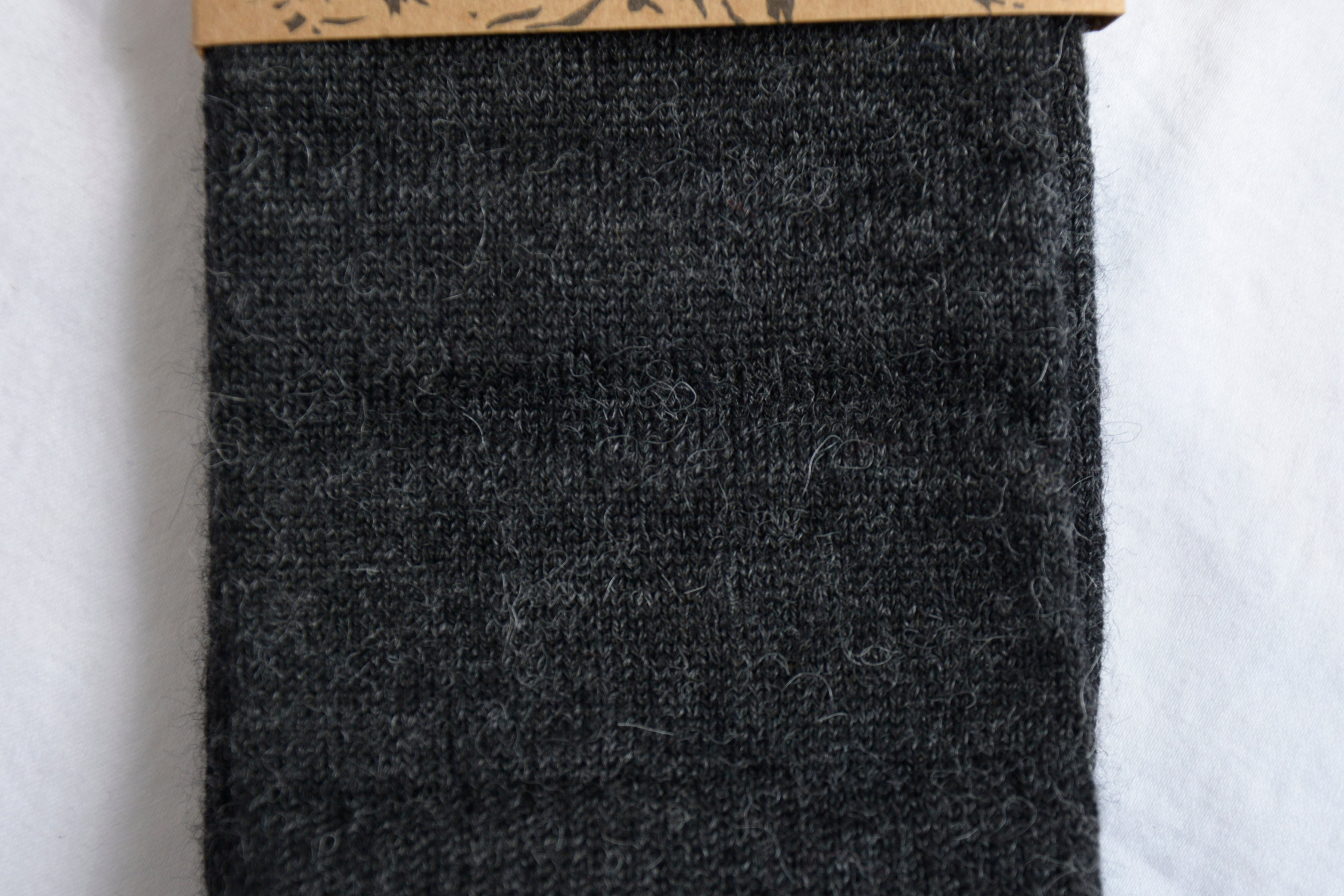 Alpaca_clothes_en_Peru_black_socks