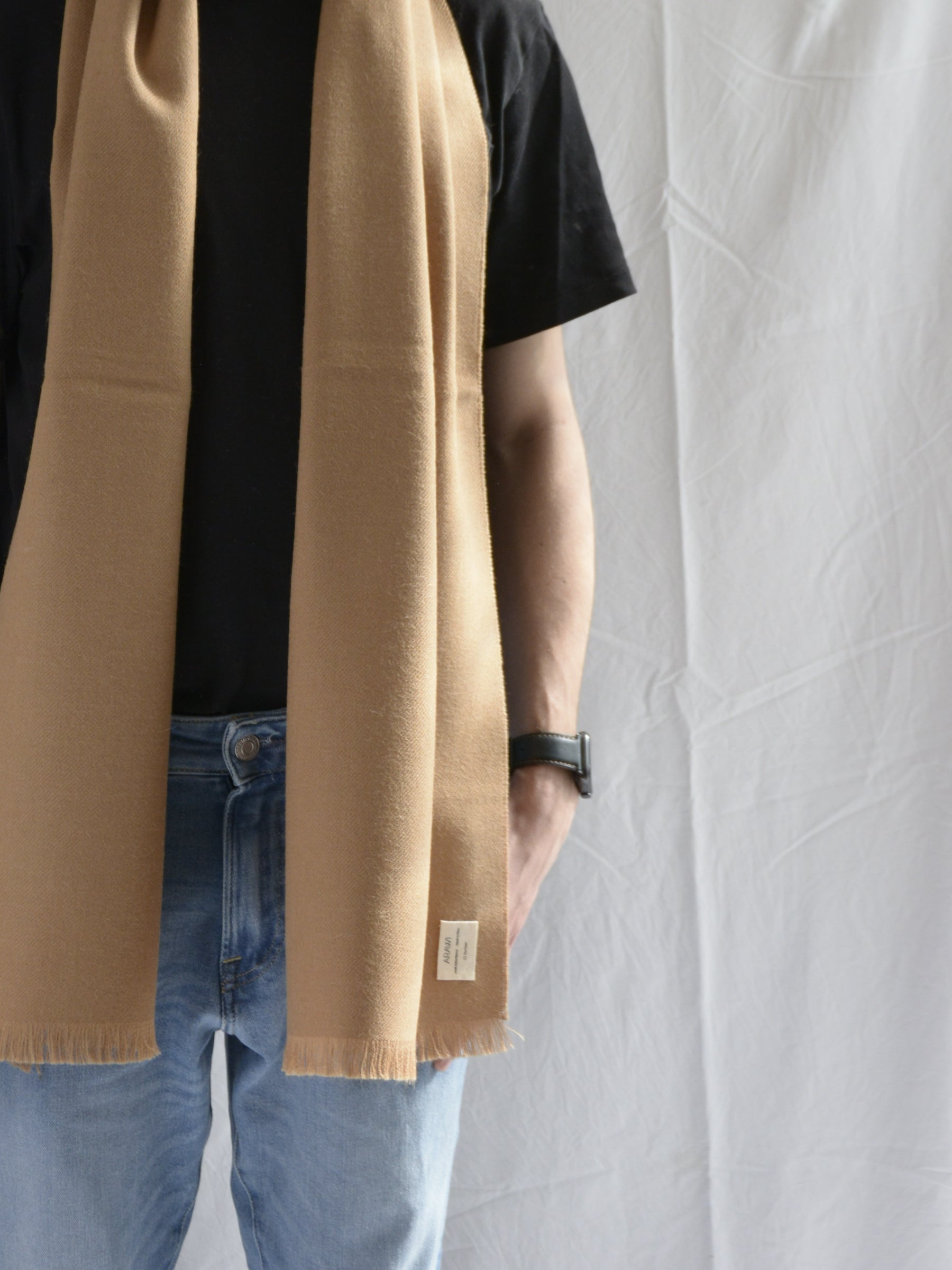 Man_wearing_brown_hat_and_yellow_scarf_in_Peru