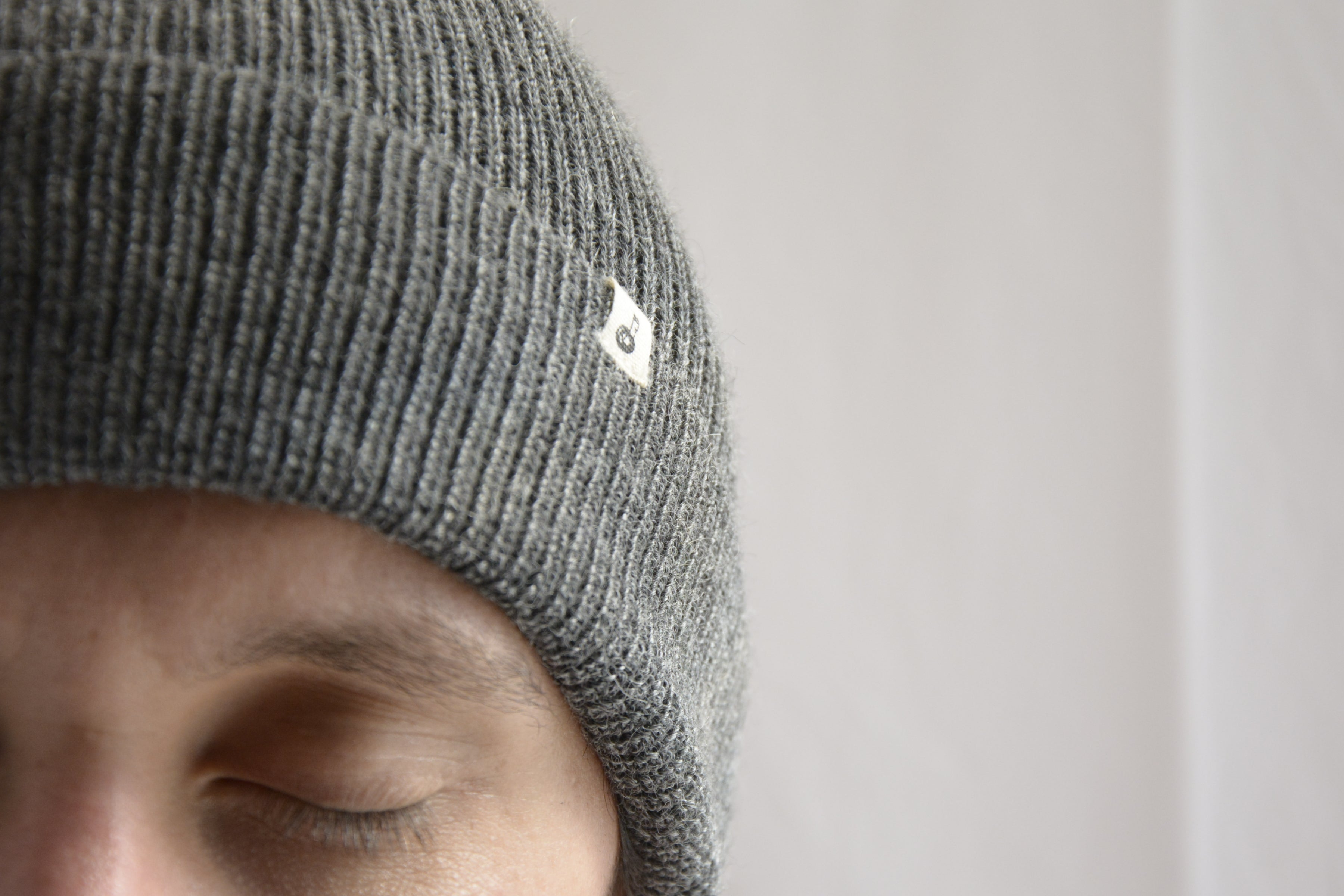 Man_wearing_gray_peruvian_wool_beanie