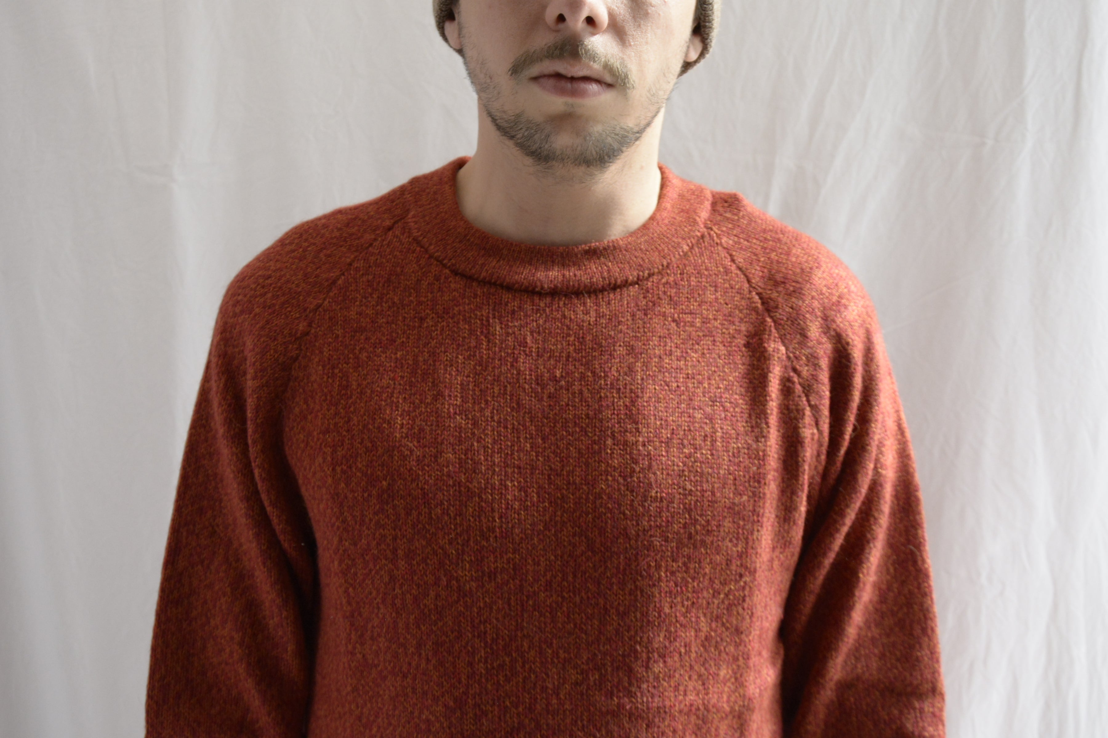 Man_with_Alpaca_wool_peruvian_orange_colored