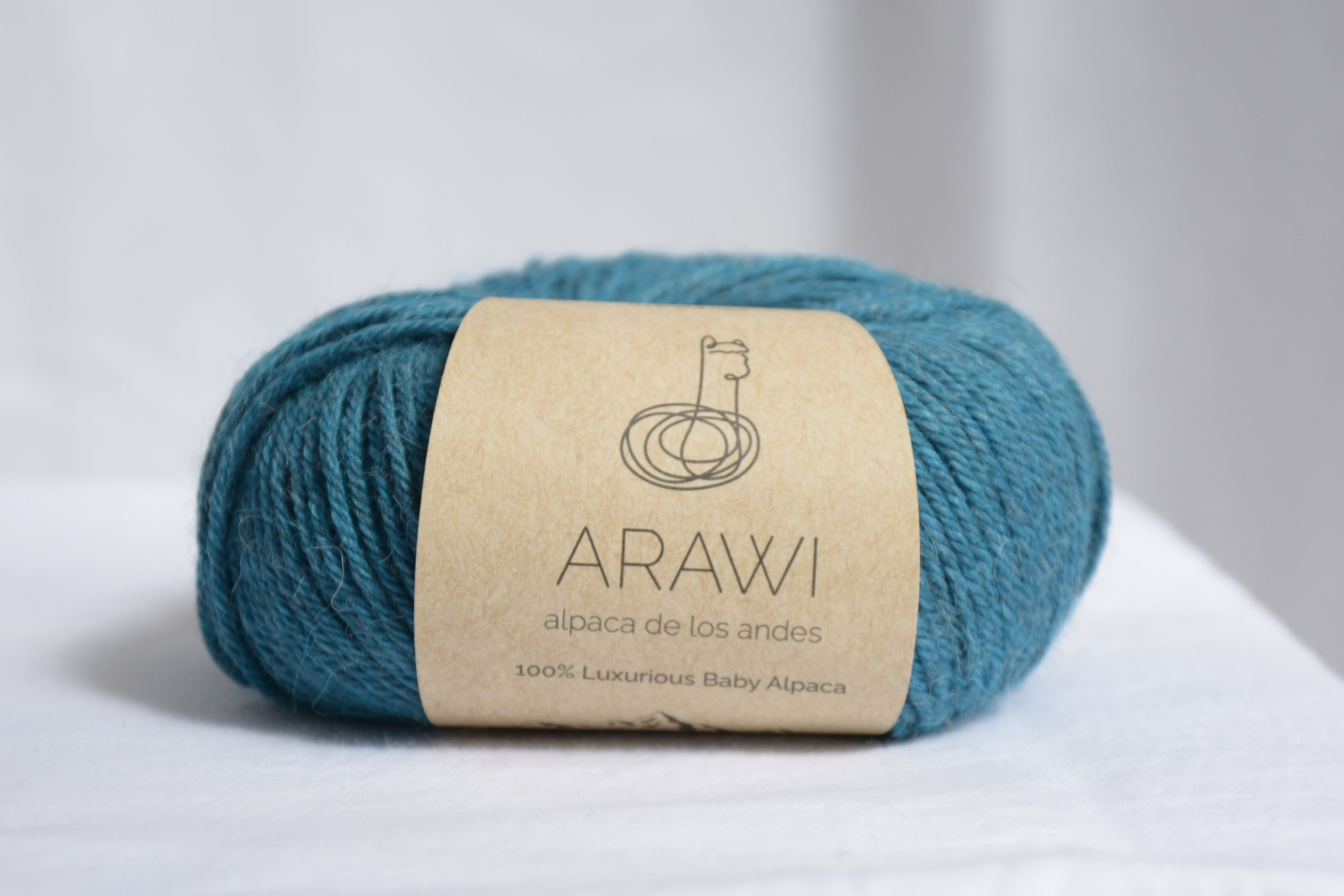 Ball_of_ baby_peruvian_alpaca_yarn_blue_aqua_colored