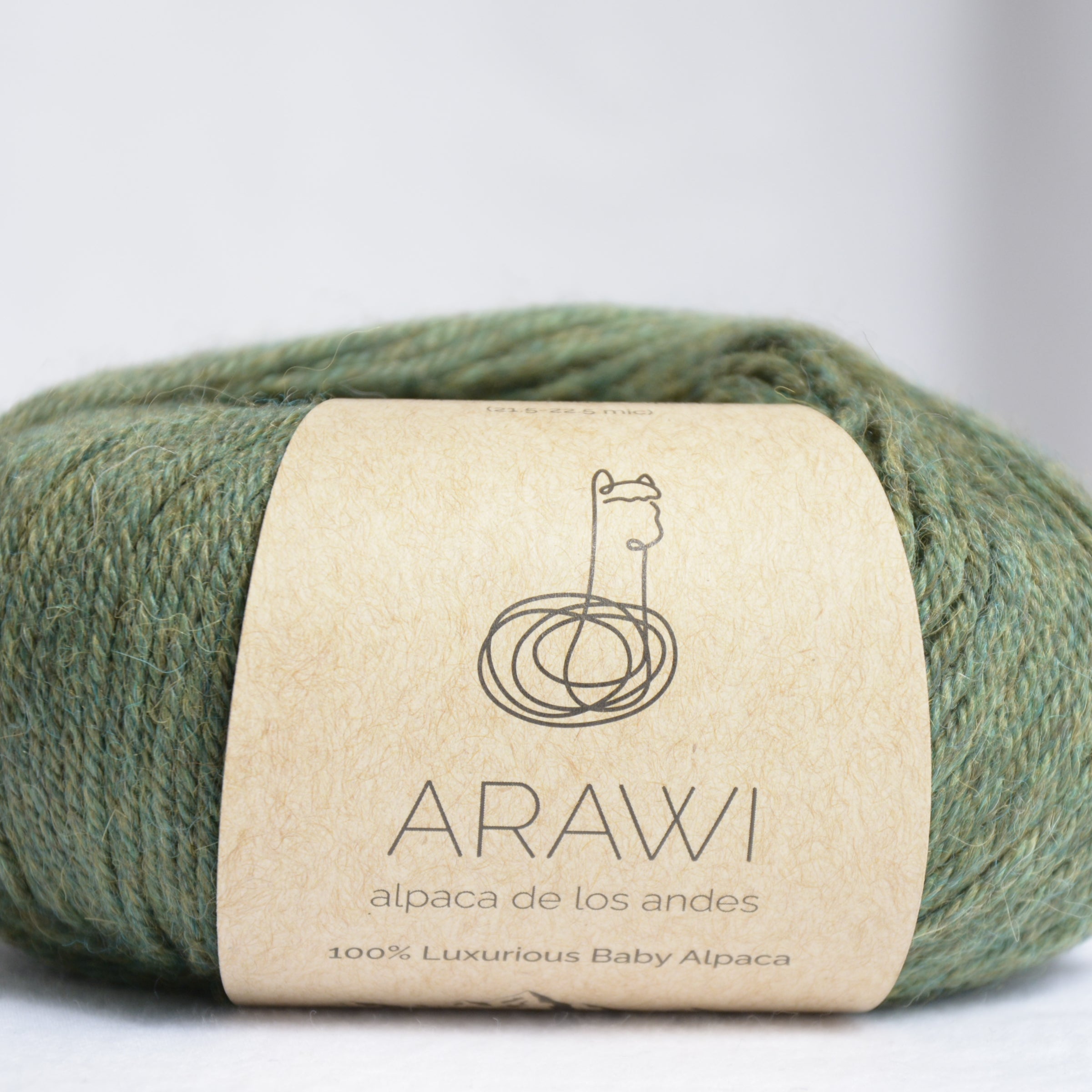 Ball_of_ baby_peruvian_alpaca_yarn_green_colored