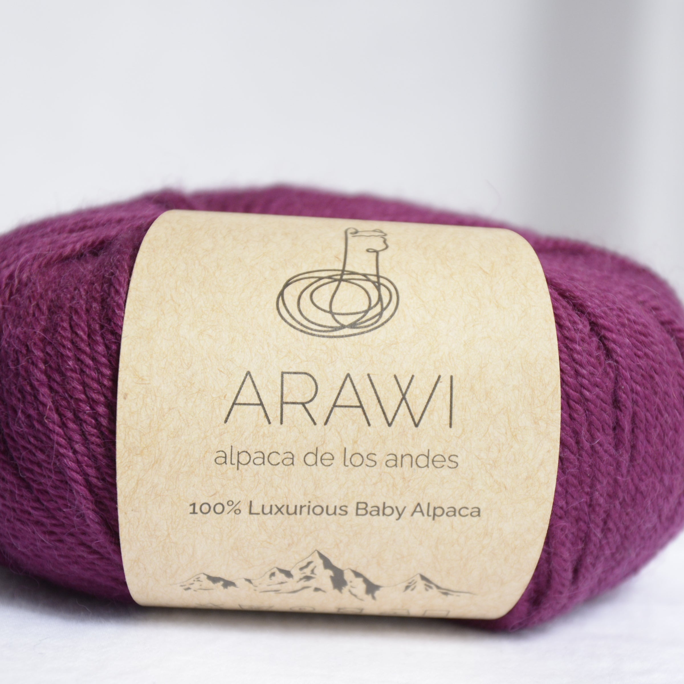 Ball_of_ baby_peruvian_alpaca_yarn_purple_colored