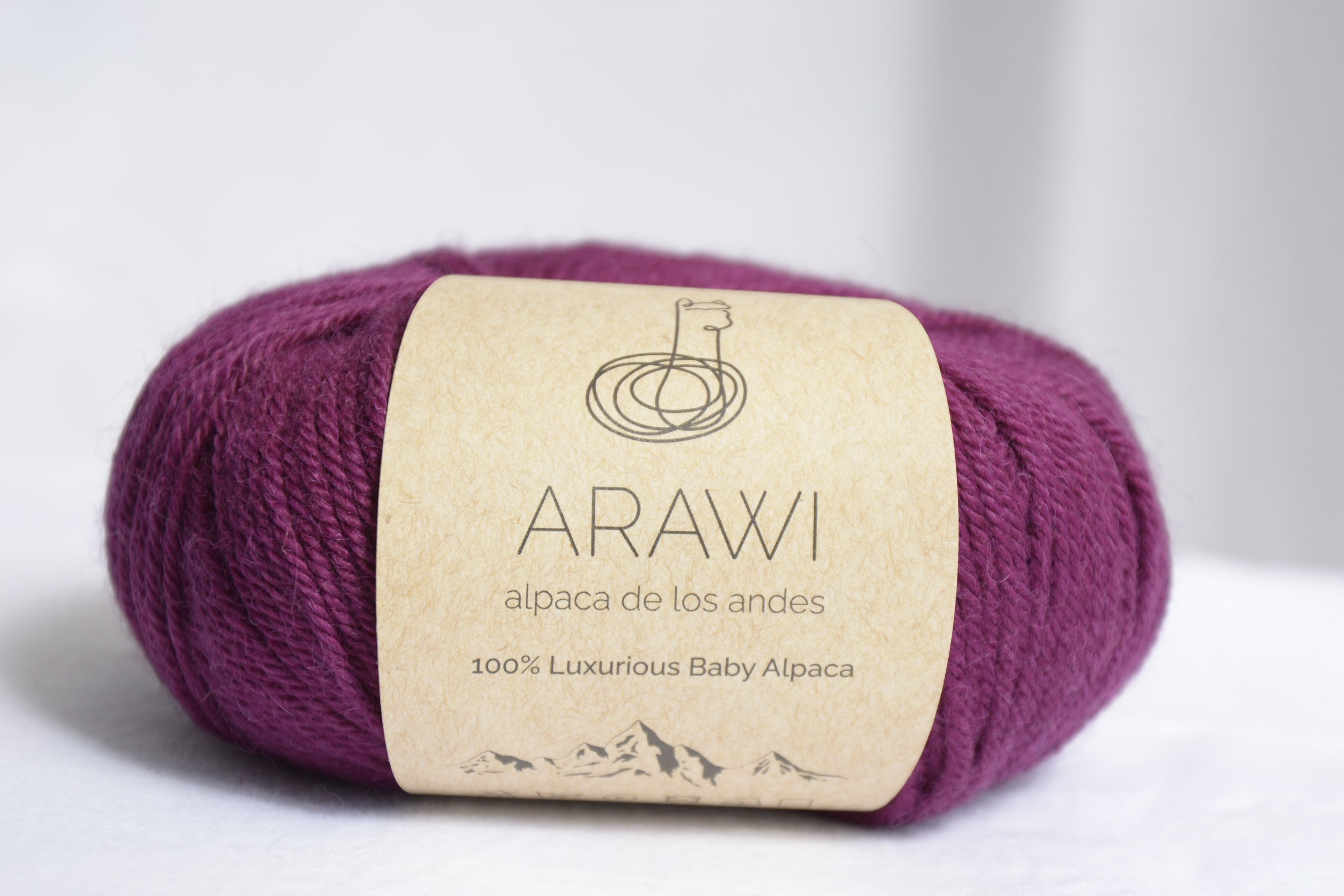 Ball_of_ baby_peruvian_alpaca_yarn_purple_colored