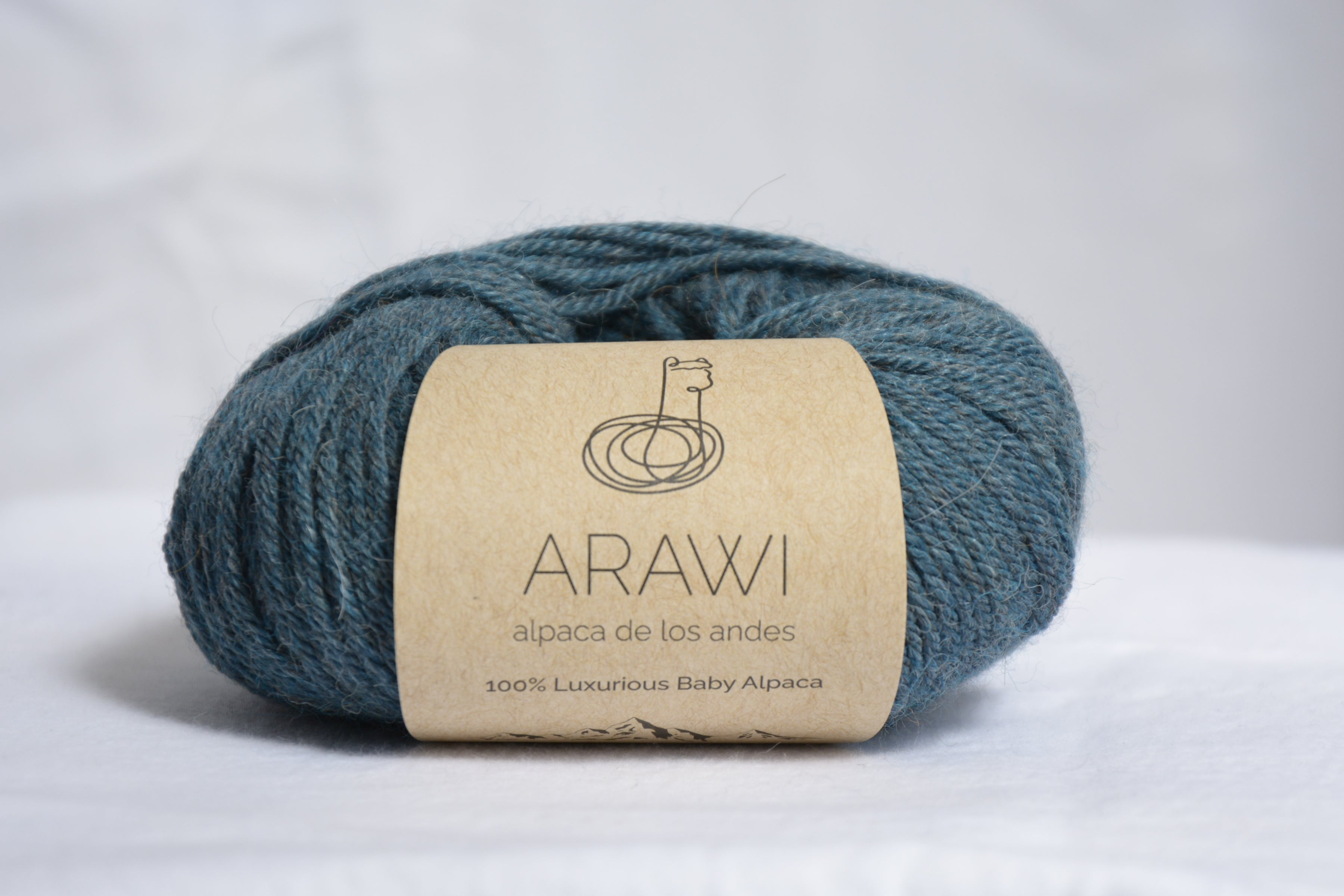 Ball_of_ baby_peruvian_alpaca_ yarn_steel_blue_colored