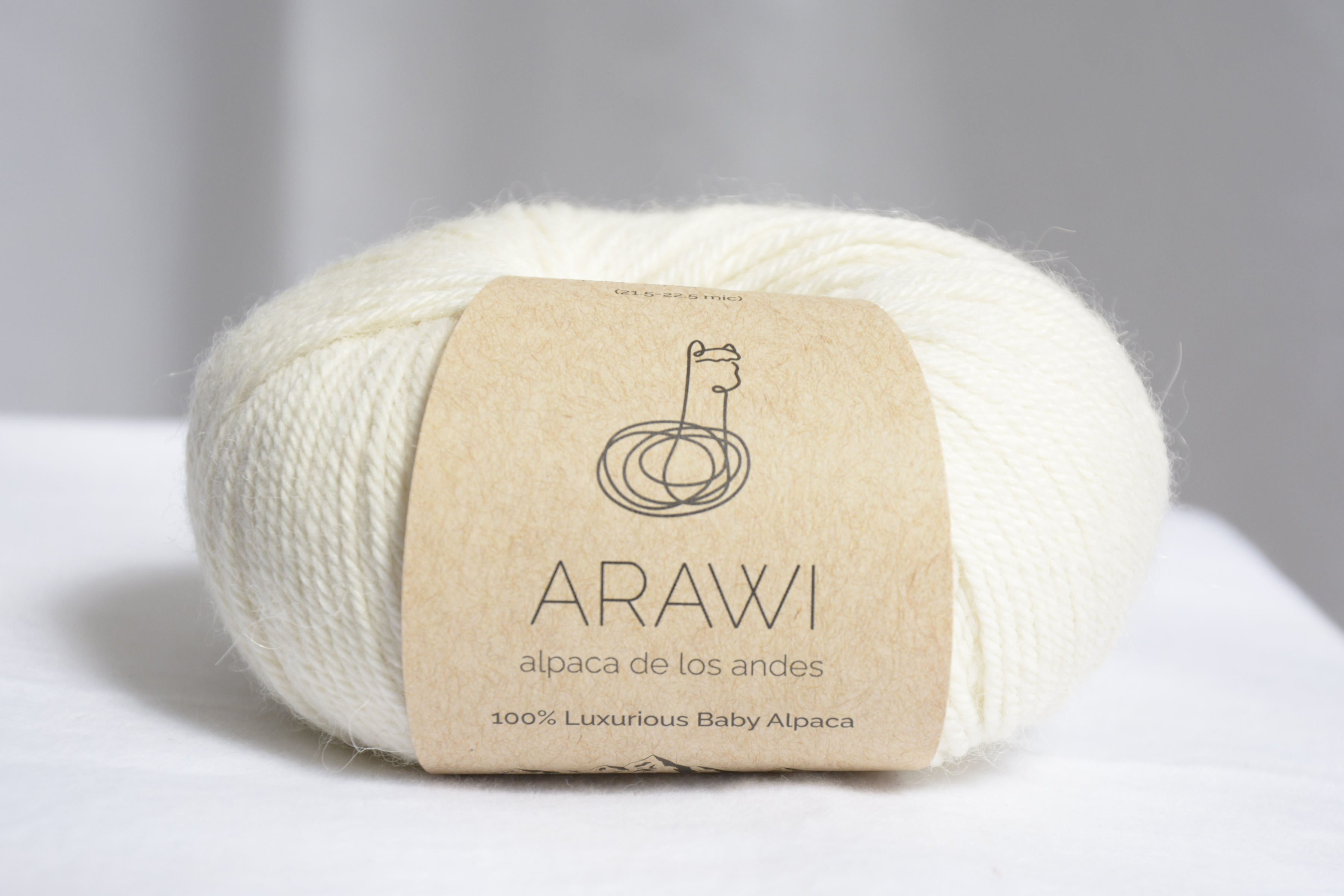 Ball_of_ baby_peruvian_alpaca_yarn_white_colored