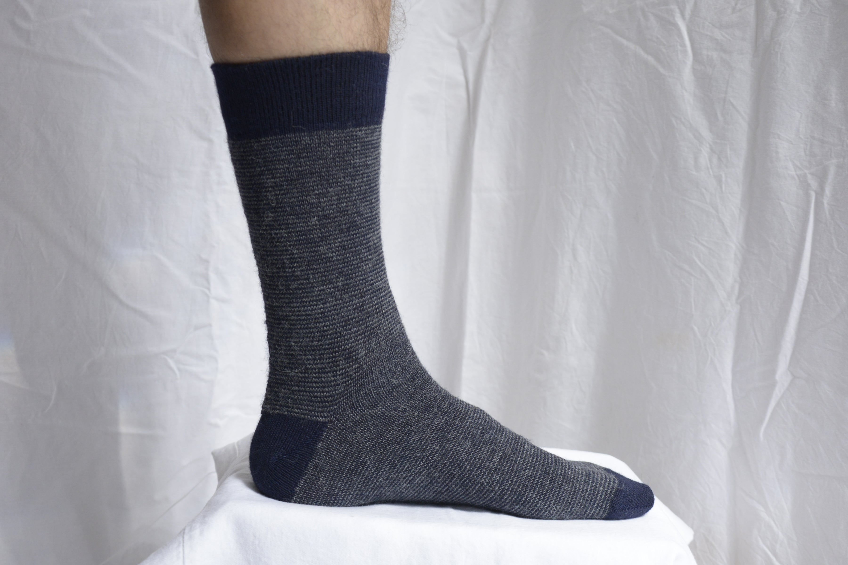 Alpaca_wool_clothing_Peru_foot_with_marine_sock