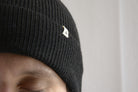 Man_wearing_black_peruvian_wool_beanie