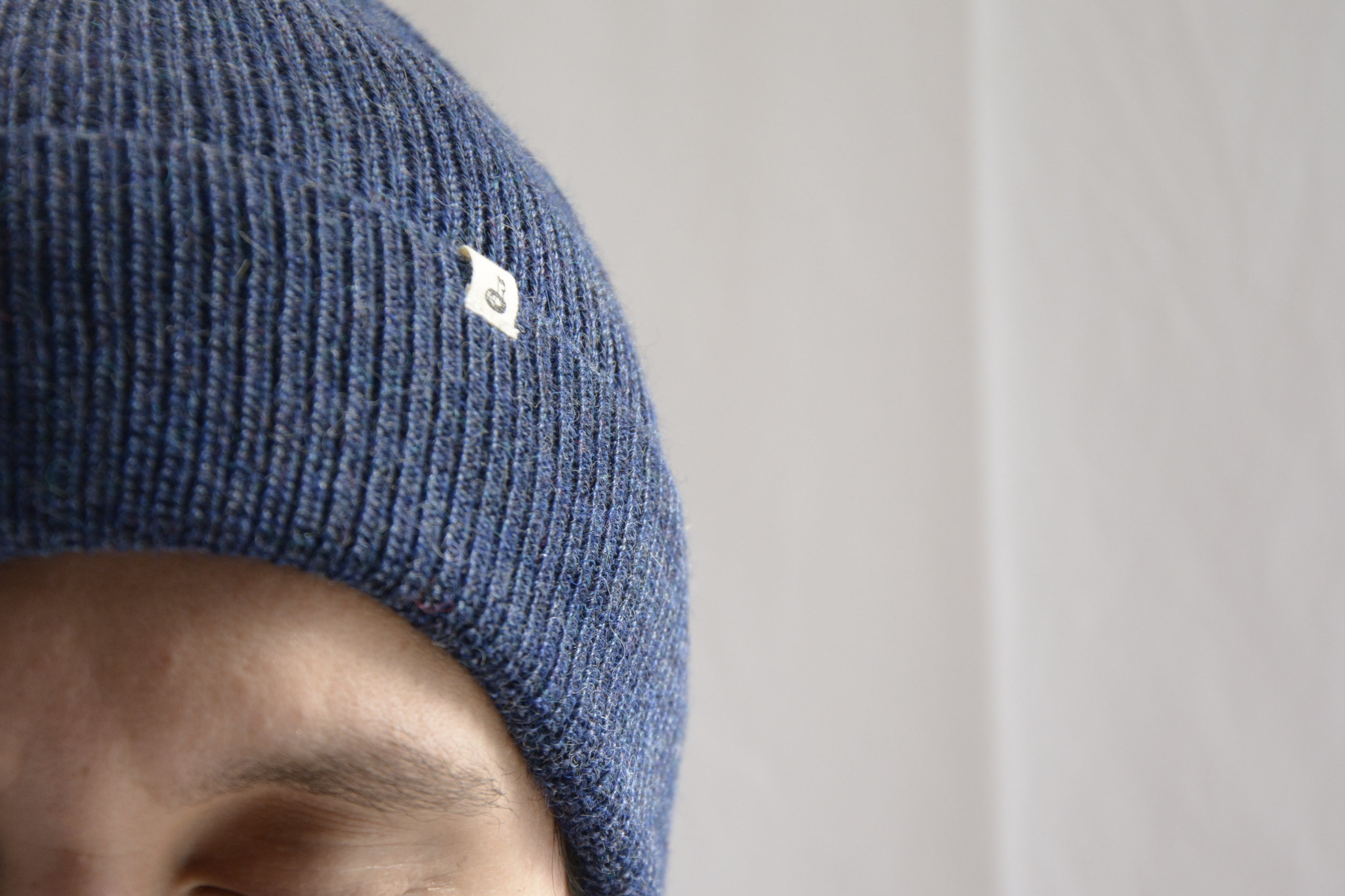 Man_wearing_blue_peruvian_wool_beanie