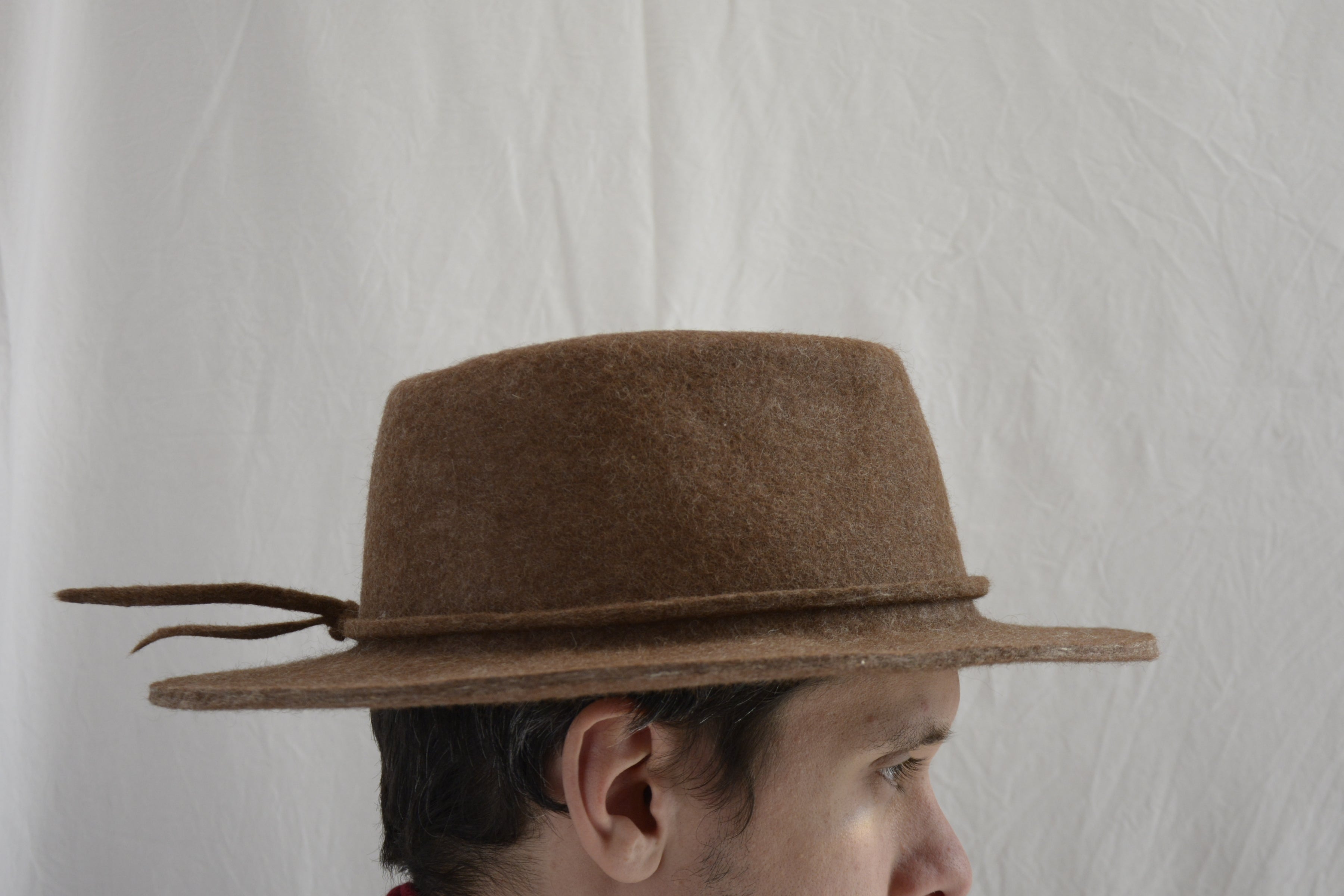 Man_wearing_brown_peruvian_wool_hat
