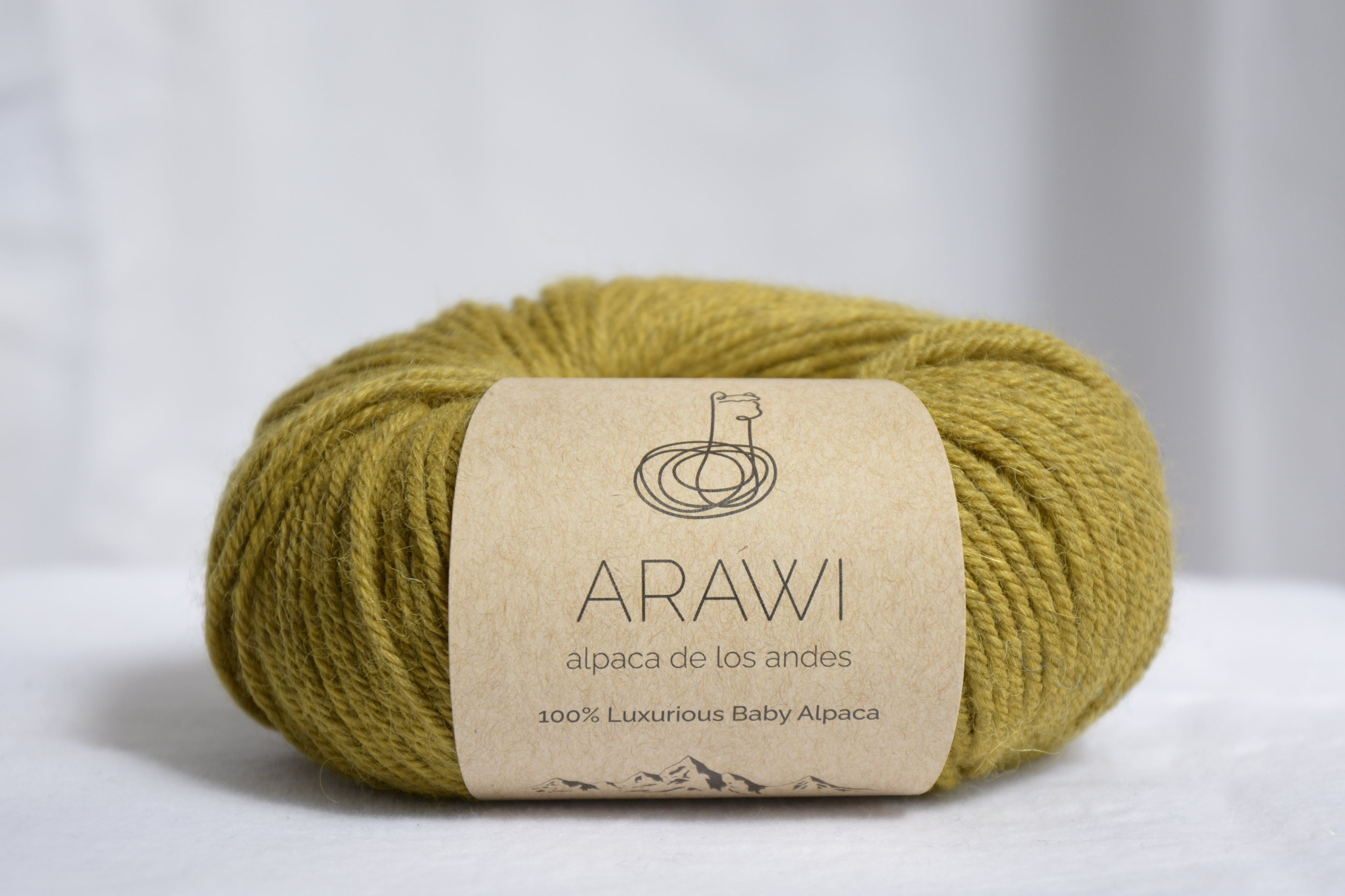 Ball_of_ baby_peruvian_alpaca_yarn_yellow_colored