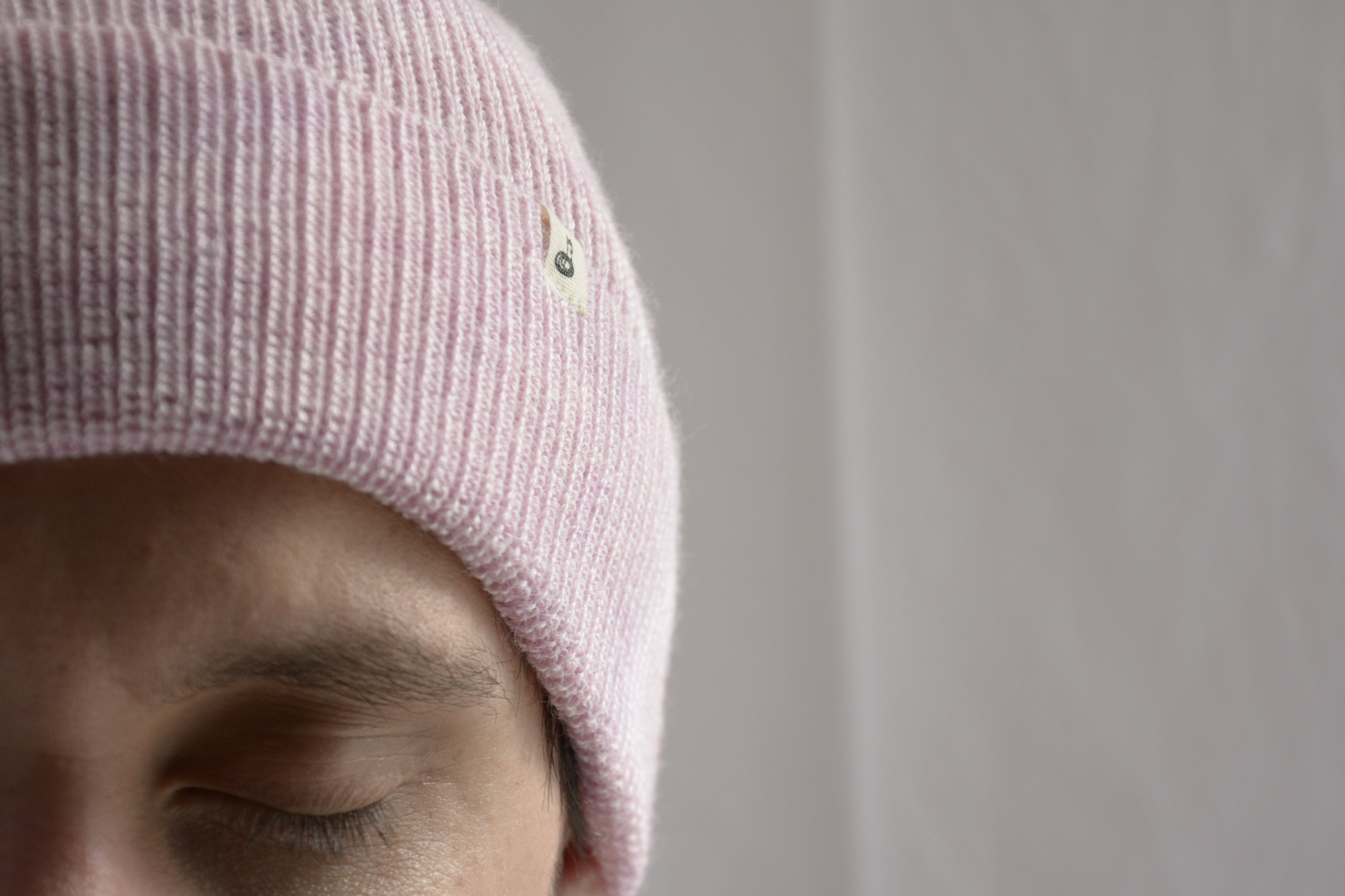 Wearing_pink_peruvian_wool_beanie