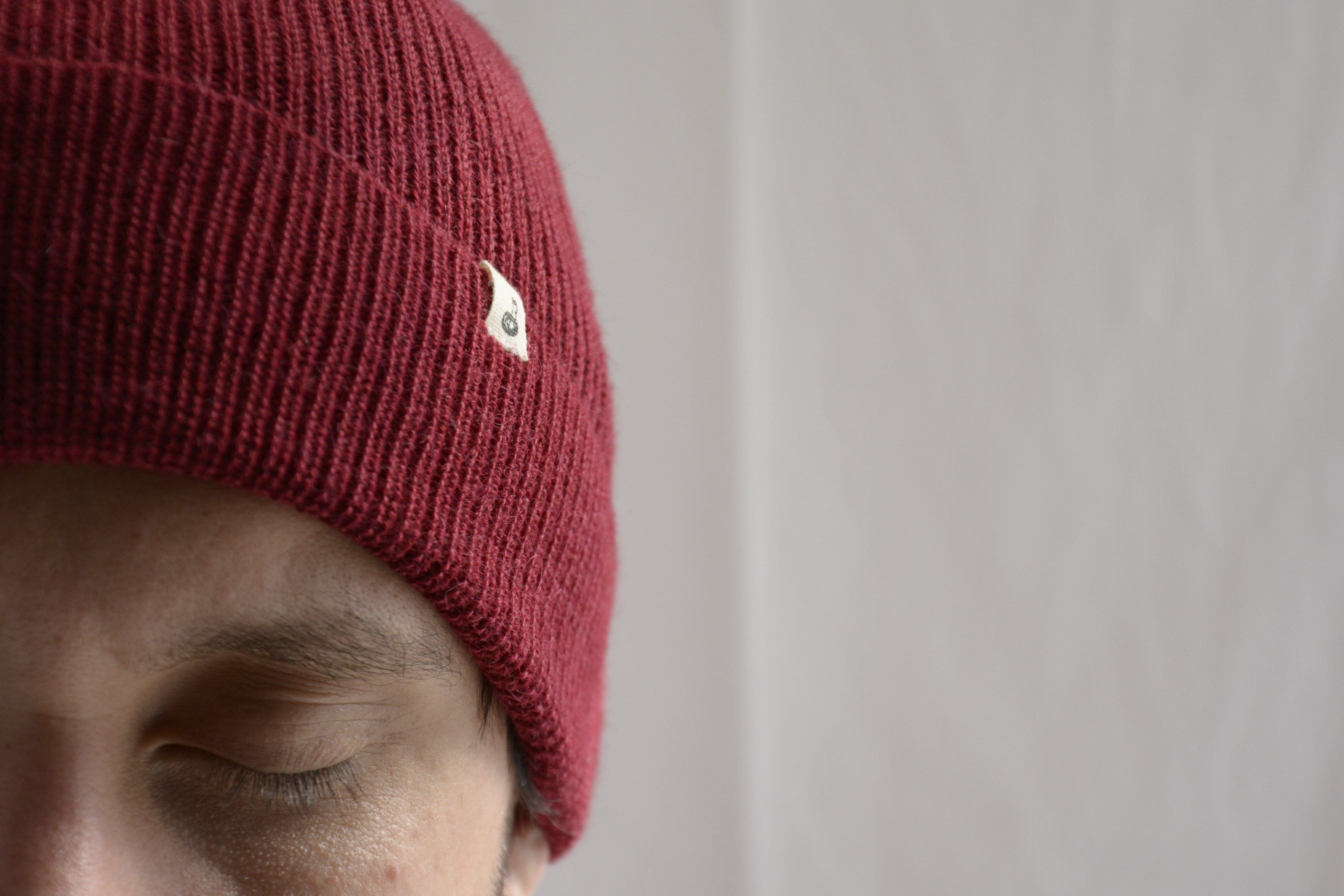 Man_wearing_red_peruvian_wool_beanie